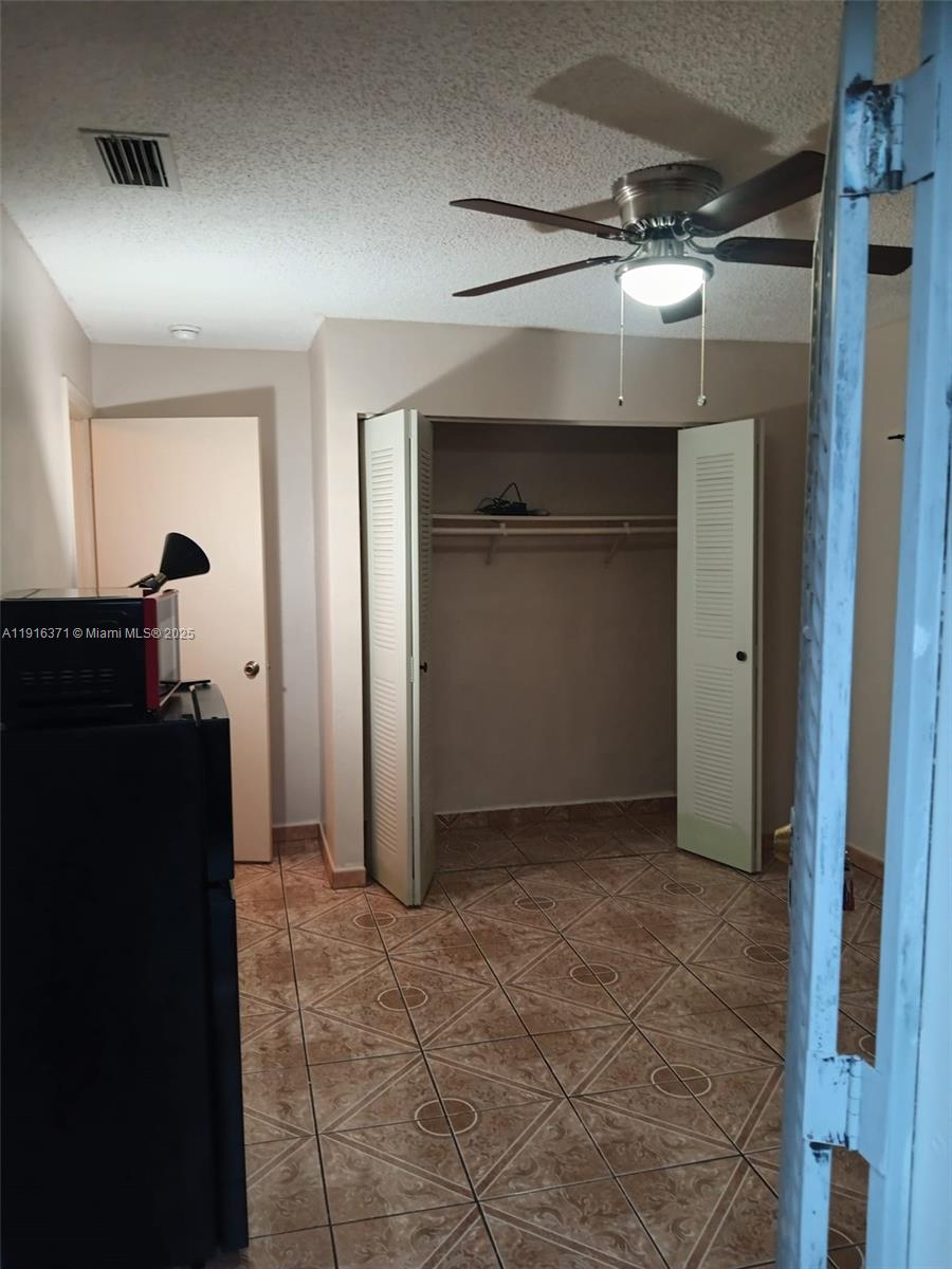 26636 Southwest 126th Avenue Homestead, FL 33032 - Photo 7 of 14 a view of a utility room with closet
