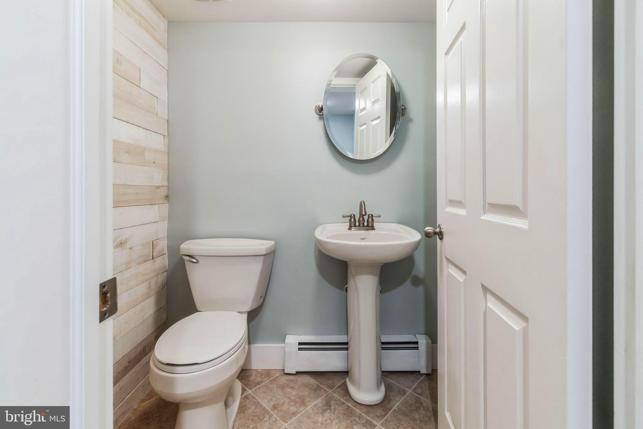 1114 Old Post Road Perkasie, PA 18944 - Photo 9 of 27 Lower Level Half Bathroom