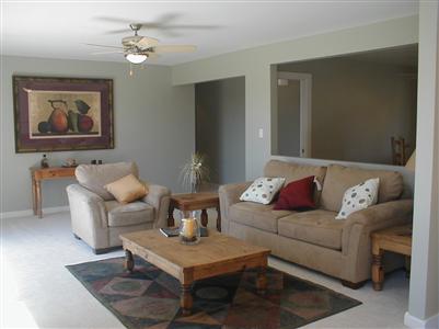 2575 Laguna Road Santa Rosa, CA 95401 - Photo 3 of 6 a living room with furniture and a chandelier