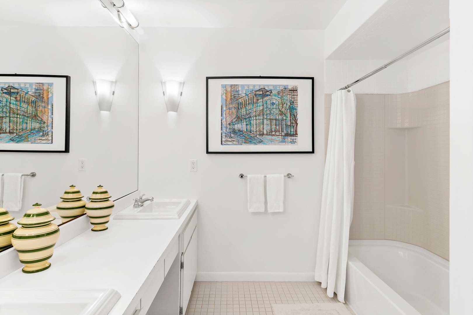 218 Bull Path East Hampton, NY 11937 - Photo 16 of 20 a bathroom with a sink a bathtub and a shower