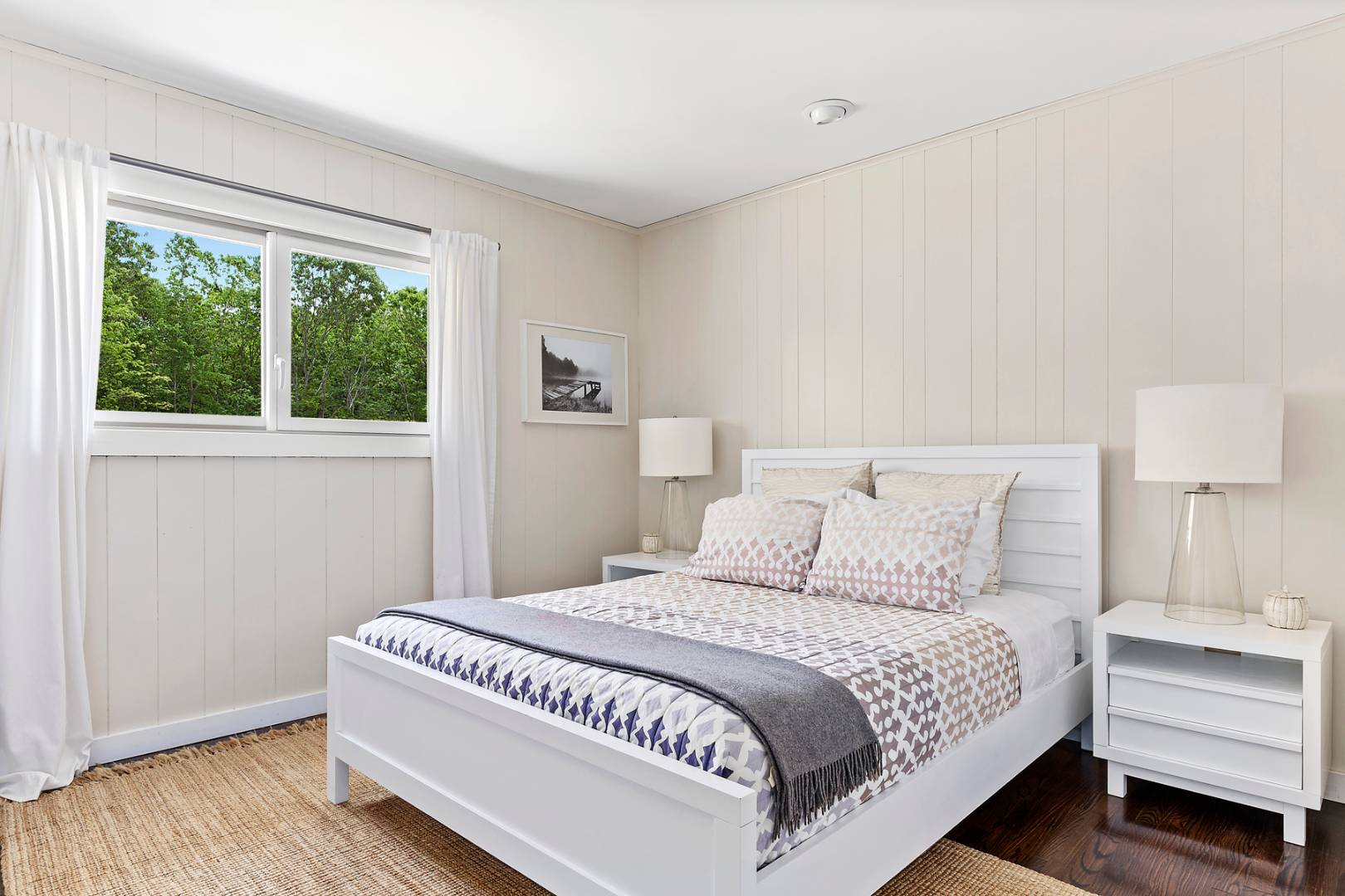 218 Bull Path East Hampton, NY 11937 - Photo 17 of 20 a bedroom with a bed and a window