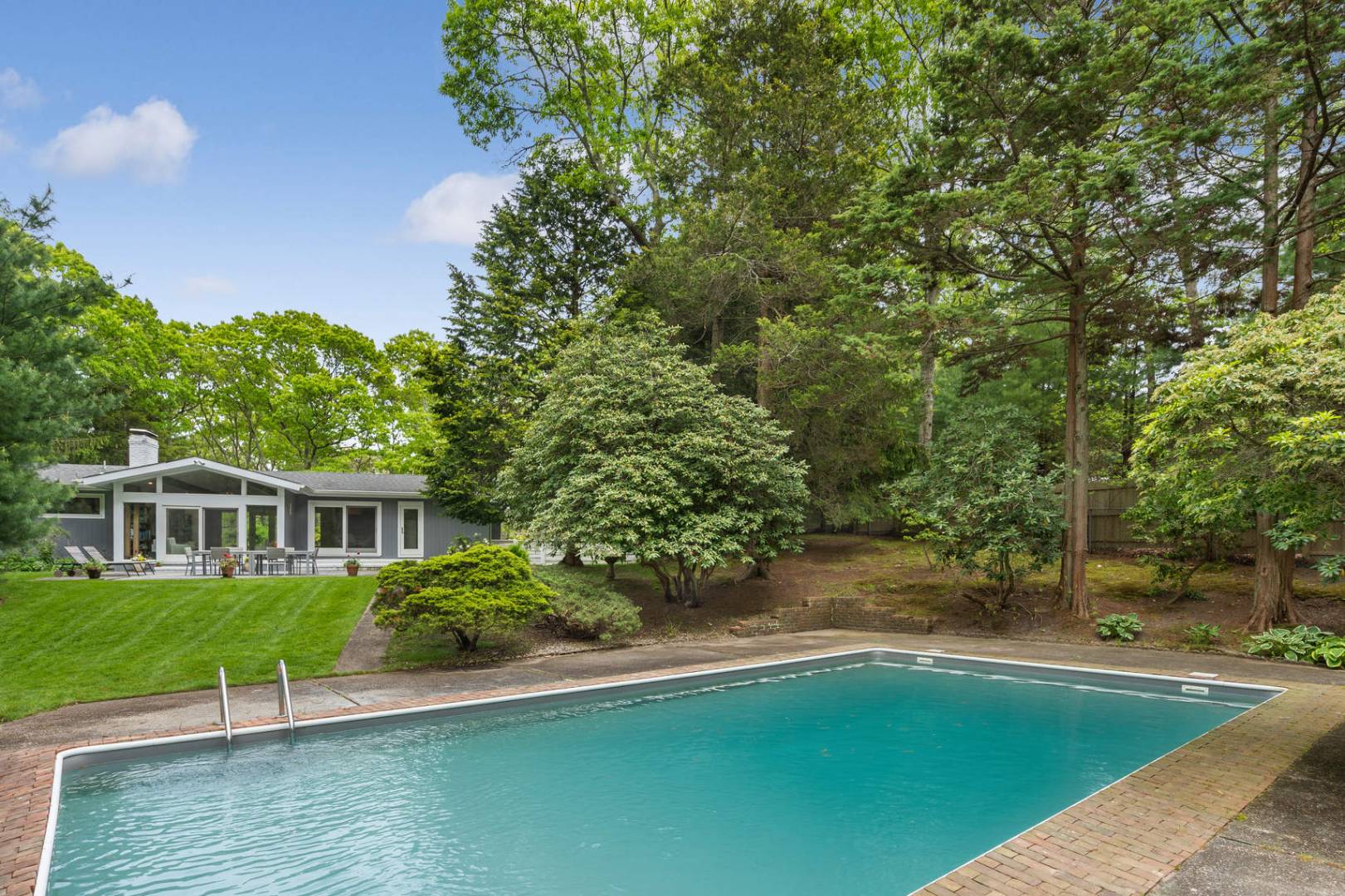 218 Bull Path East Hampton, NY 11937 - Photo 20 of 20 a view of a house with pool