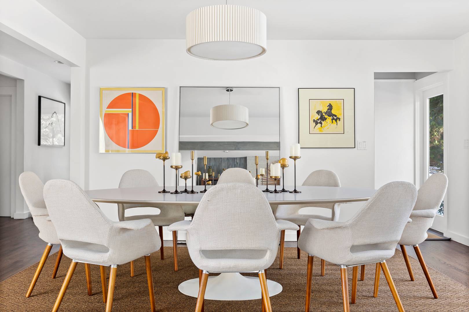 218 Bull Path East Hampton, NY 11937 - Photo 7 of 20 a view of a dining room with furniture and wooden floor