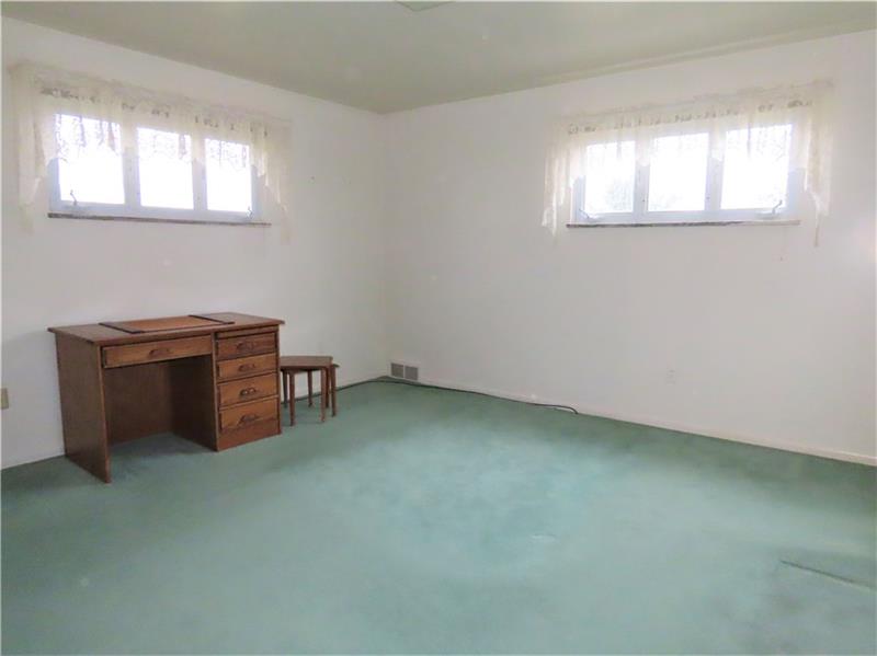 675 Davidson Drive Rochester, PA 15074 - Photo 14 of 25 Very large main bedroom with high windows for easy placement of furniture