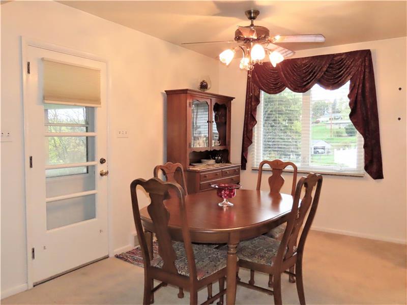 675 Davidson Drive Rochester, PA 15074 - Photo 7 of 25 Nice dining room with rear yard view and side door to covered patio