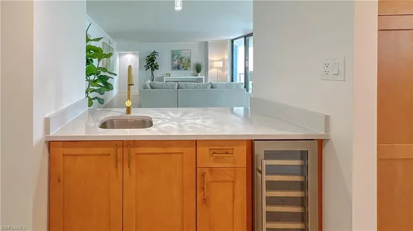 a kitchen that has a sink and a window