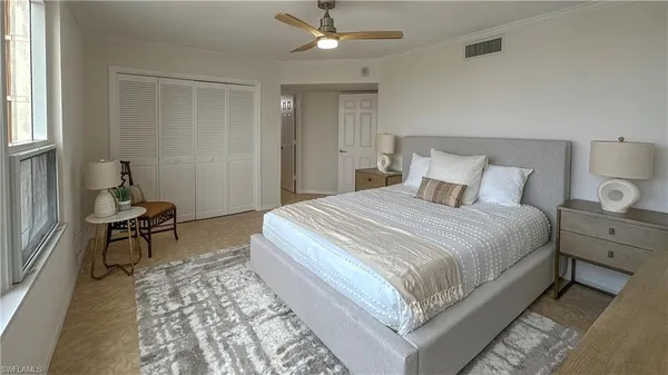 a bathroom with a toilet a sink a glass door a shower and a mirror