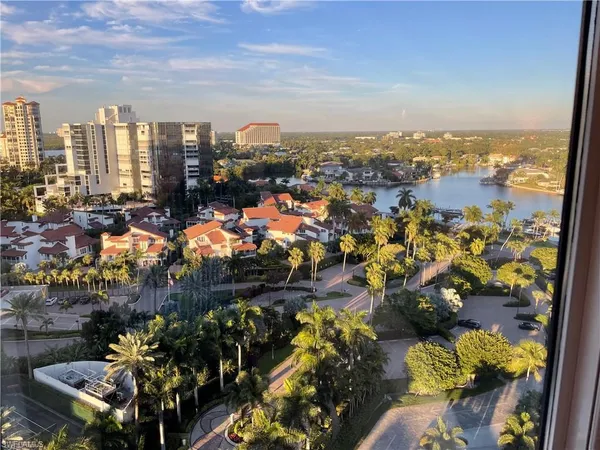 a view of city with ocean