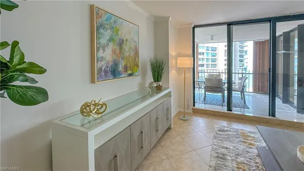 a spacious bathroom with a granite countertop sink a mirror and a shower