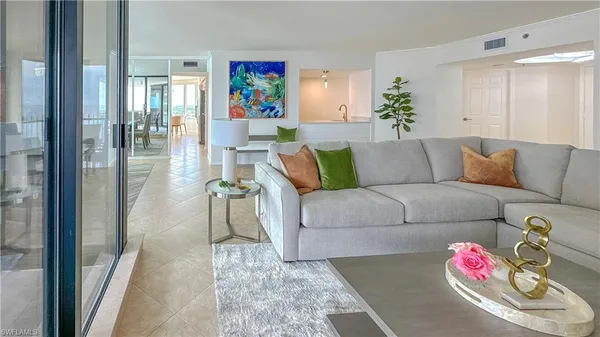 a living room with furniture and a couch