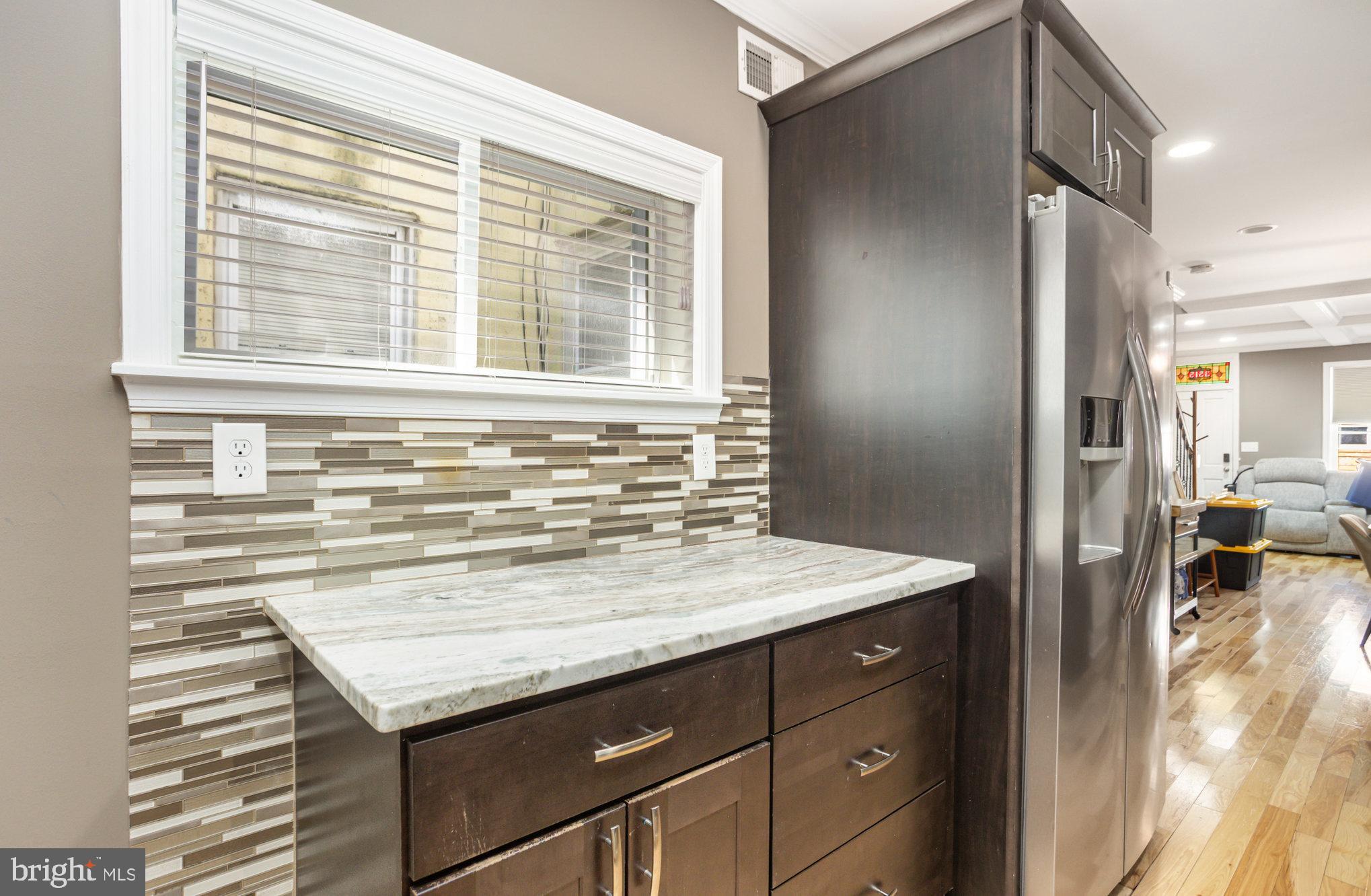 3515 Gough Street Baltimore, MD 21224 - Photo 12 of 27 a view of a kitchen from a hallway