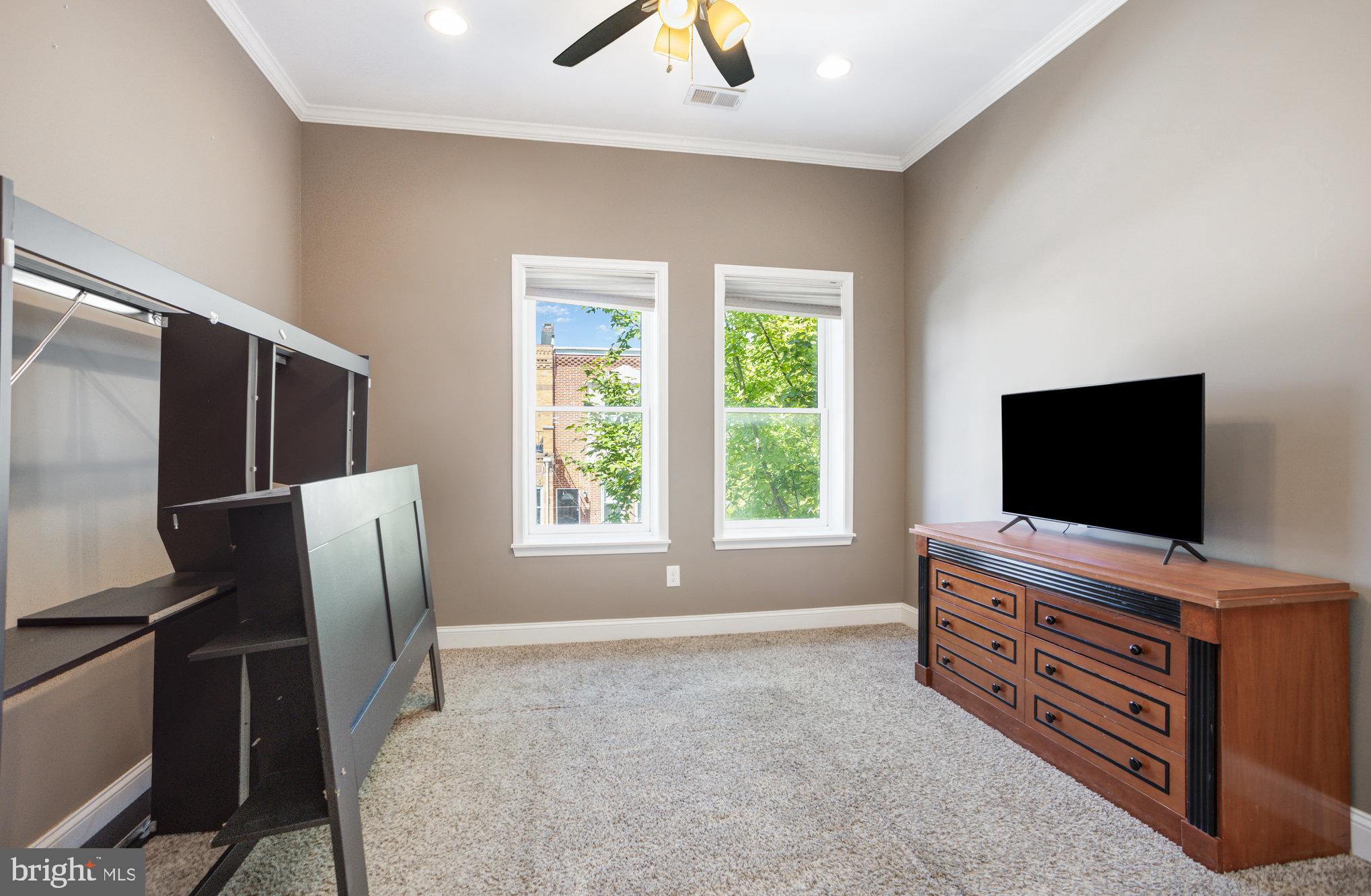 3515 Gough Street Baltimore, MD 21224 - Photo 15 of 27 a living room with furniture and flat screen tv
