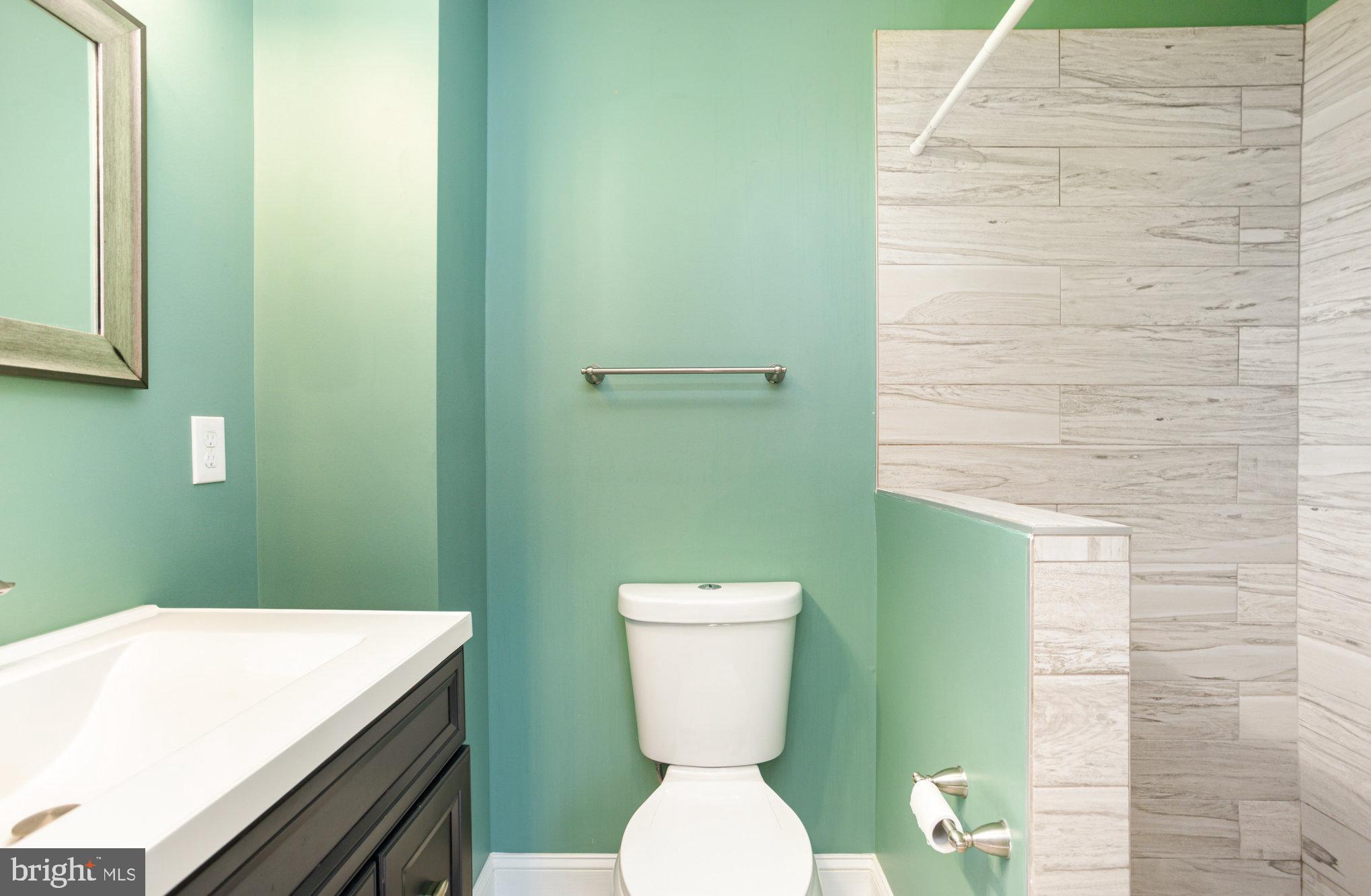 3515 Gough Street Baltimore, MD 21224 - Photo 21 of 27 a bathroom with a toilet and a sink
