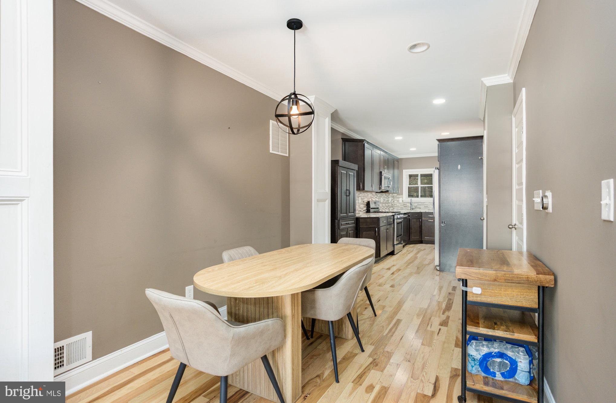 3515 Gough Street Baltimore, MD 21224 - Photo 7 of 27 a view of a dining room with furniture