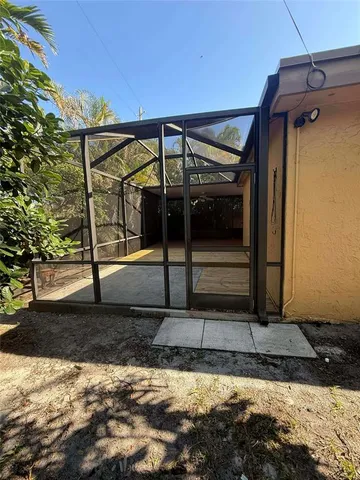a view of an empty room and window