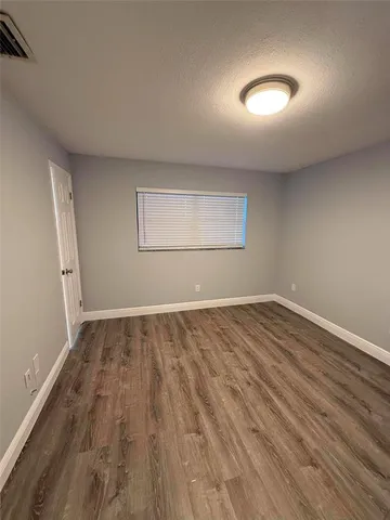 a view of a livingroom with furniture