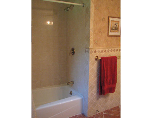 292 Cedar Street Sturbridge, MA 01518 - Photo 11 of 20 a bathroom with a bathtub and shower