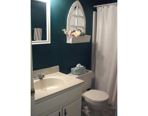 292 Cedar Street Sturbridge, MA 01518 - Photo 14 of 20 a bathroom with a sink toilet and mirror