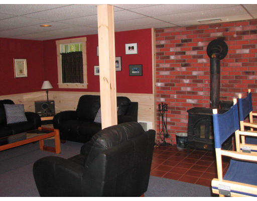 292 Cedar Street Sturbridge, MA 01518 - Photo 16 of 20 a living room with furniture and a fireplace