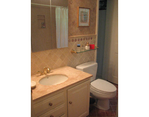 292 Cedar Street Sturbridge, MA 01518 - Photo 10 of 20 a bathroom with a sink toilet and vanity