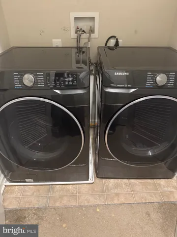 a utility room with a washer and dryer