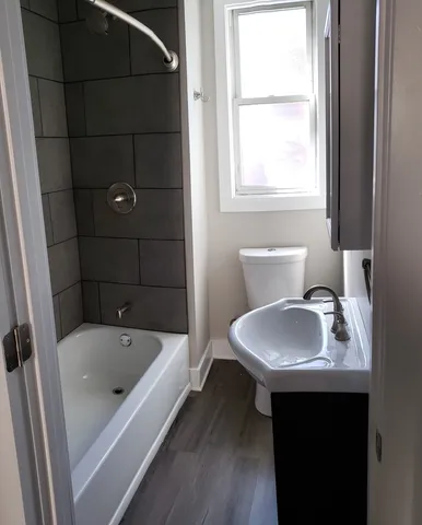 a bathroom with a sink and a bathtub
