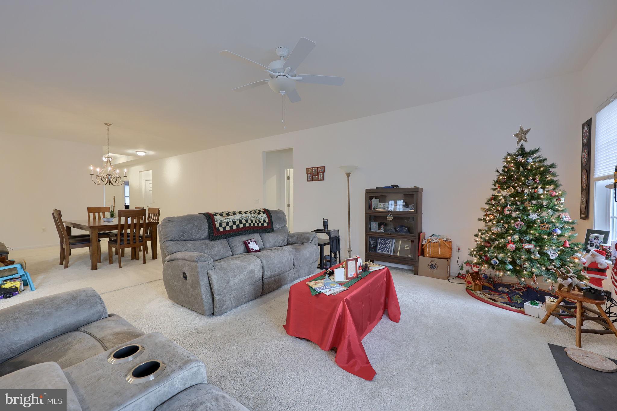 423 Valor Drive Lititz, PA 17543 - Photo 13 of 29 a living room with furniture and flowers