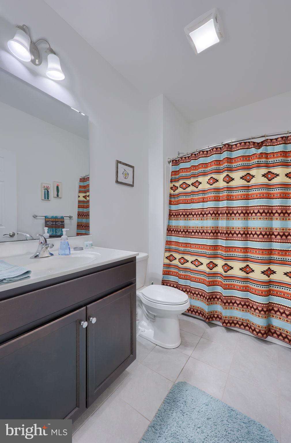 423 Valor Drive Lititz, PA 17543 - Photo 23 of 29 a bathroom with a sink and a toilet