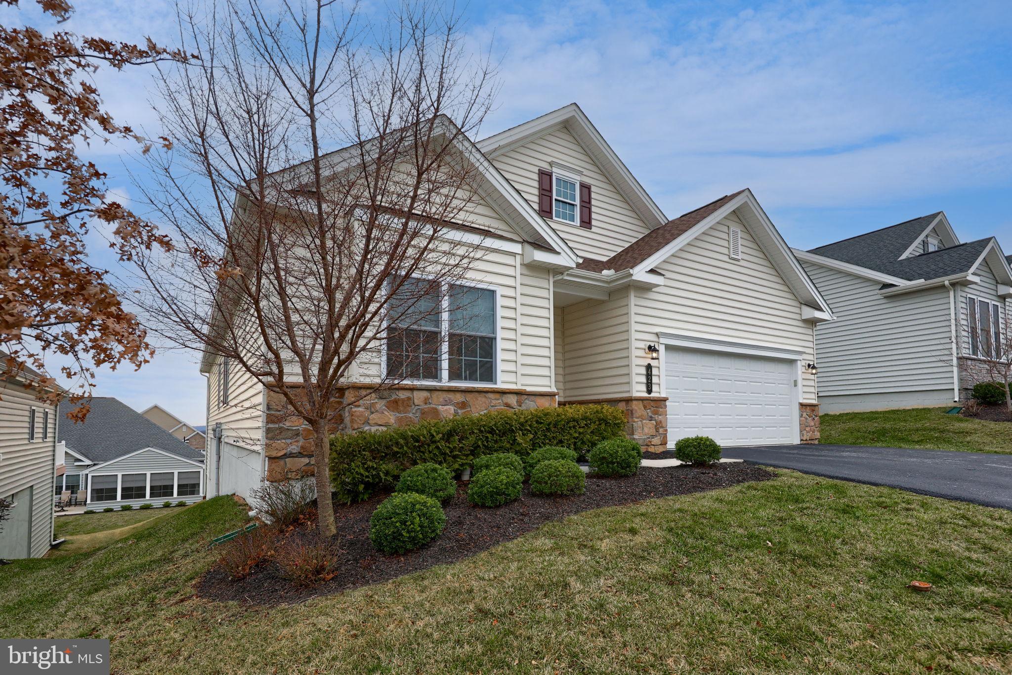 423 Valor Drive Lititz, PA 17543 - Photo 29 of 29 a front view of a house with a yard and garage