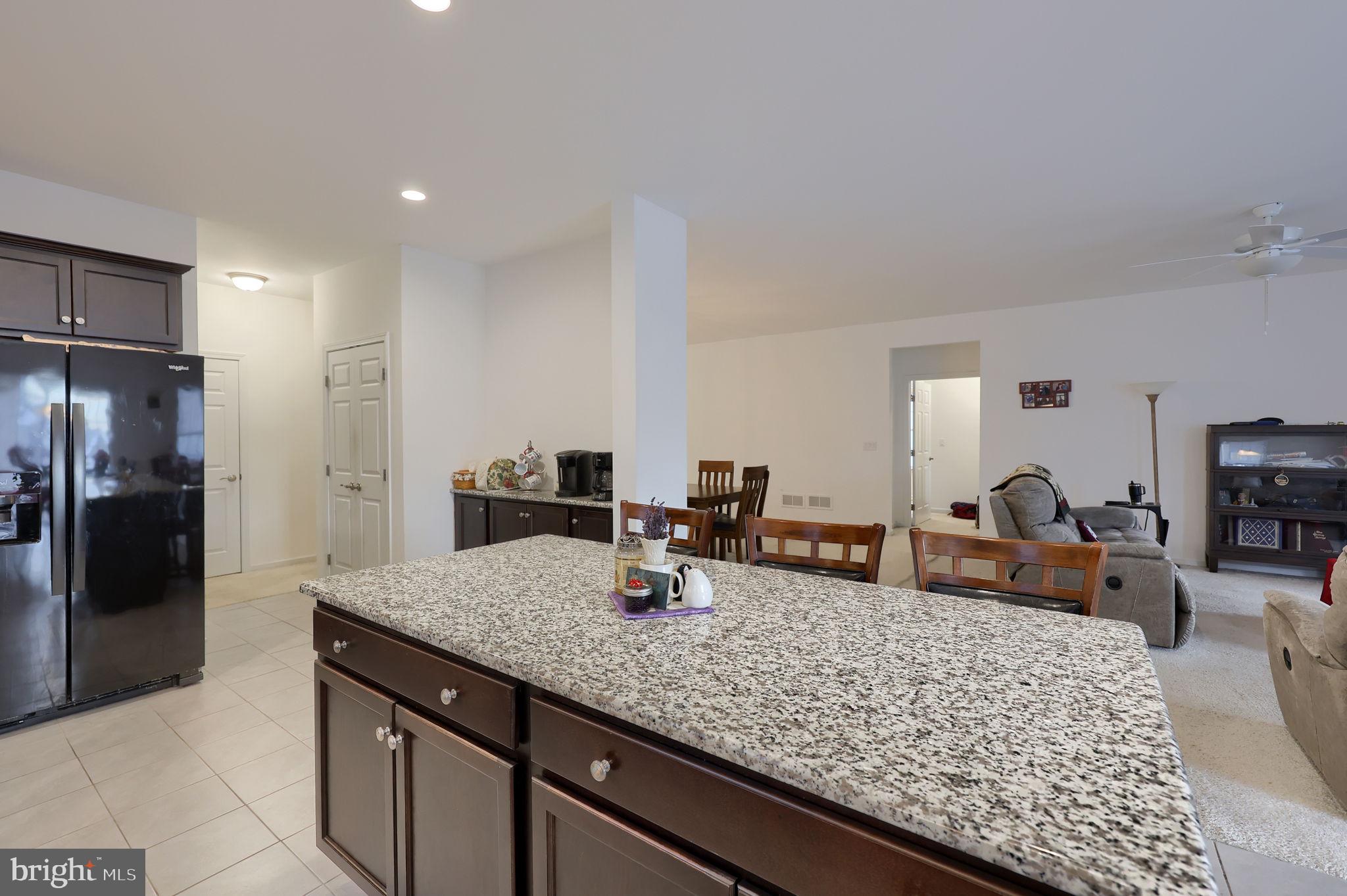 423 Valor Drive Lititz, PA 17543 - Photo 8 of 29 a kitchen with counter top space cabinets and stainless steel appliances