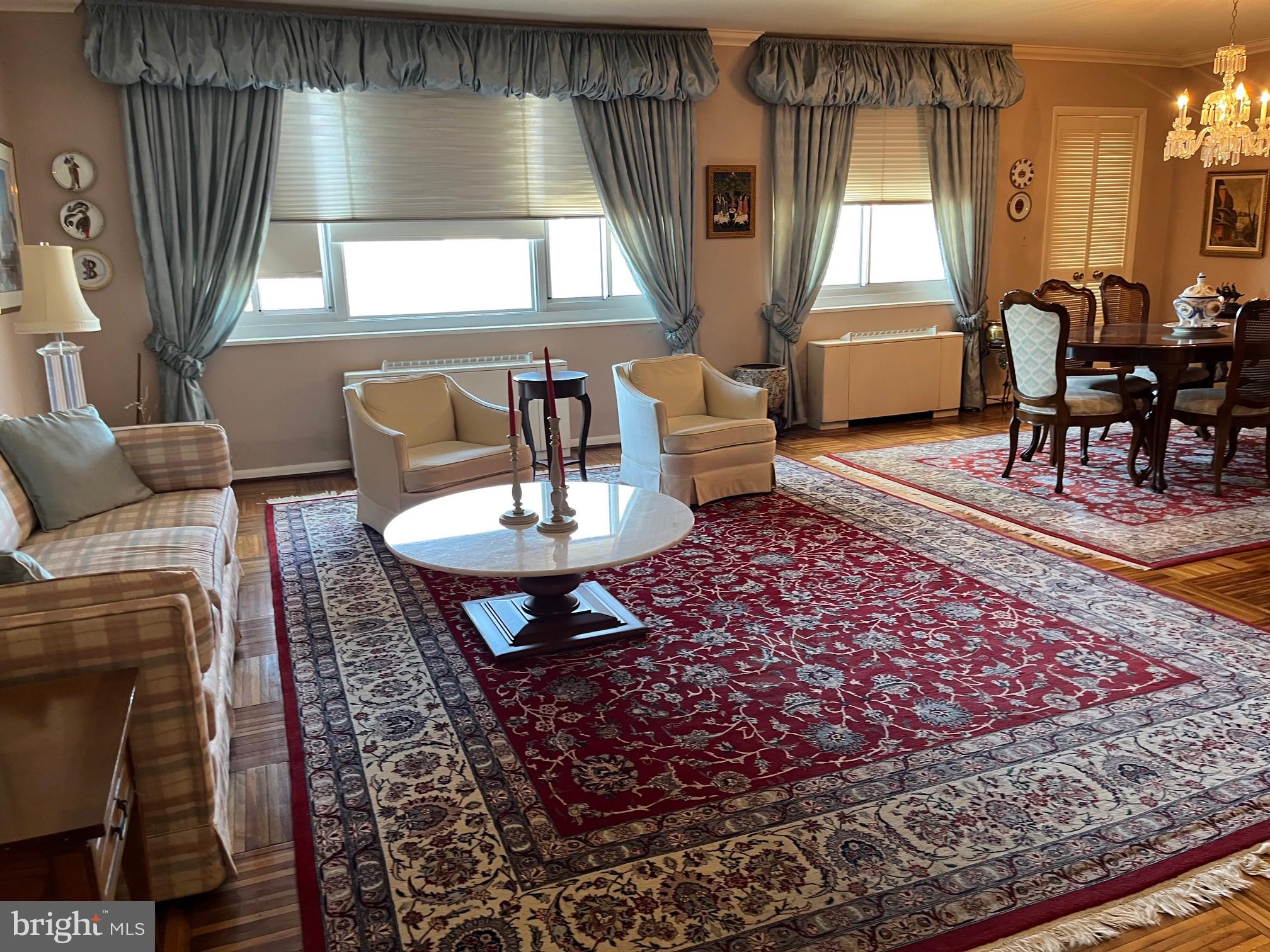 a living room with furniture and a table