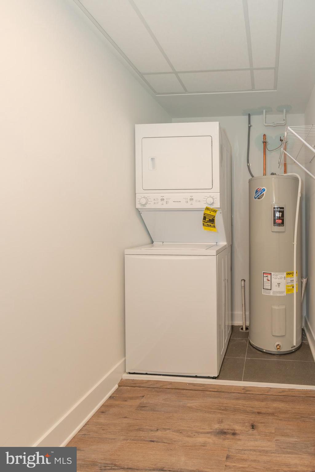 2220-28 Master Street, Unit 1 Philadelphia, PA 19121 - Photo 11 of 14 a utility room with dryer and washer