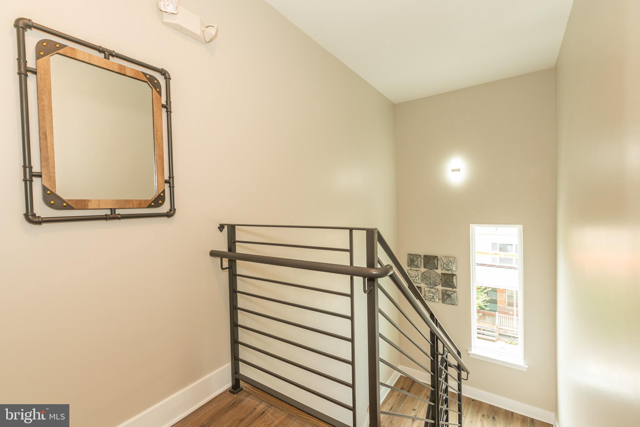2220-28 Master Street, Unit 1 Philadelphia, PA 19121 - Photo 12 of 14 a view of a hallway with entryway