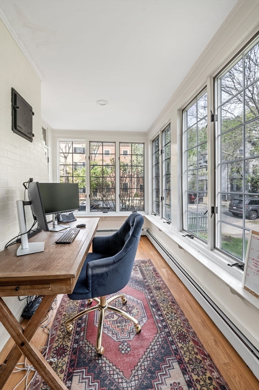 31 Broad Street Salem, MA 01970 - Photo 13 of 39 a workspace with furniture and a floor to ceiling window