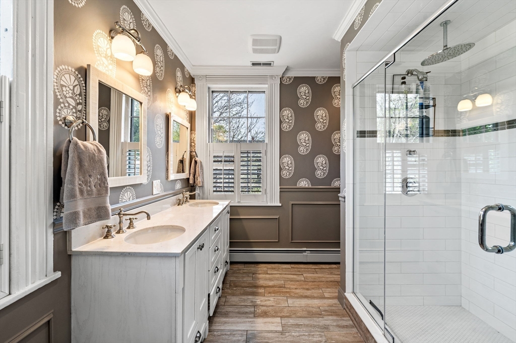 31 Broad Street Salem, MA 01970 - Photo 25 of 39 a bathroom with a granite countertop sink mirror and double