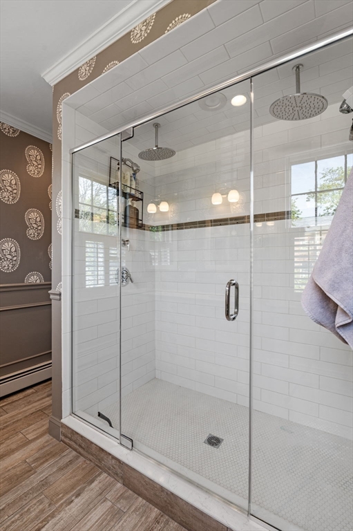 31 Broad Street Salem, MA 01970 - Photo 26 of 39 a bathroom with a glass shower door