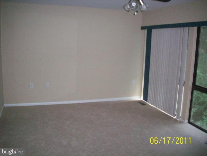 11609 Windbluff Court, Unit 9/009 Reston, VA 20191 - Photo 23 of 26 Master Bedroom