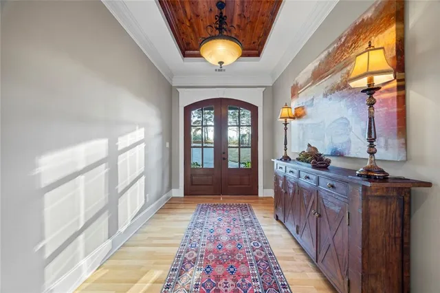 a dining room with furniture and wooden floor