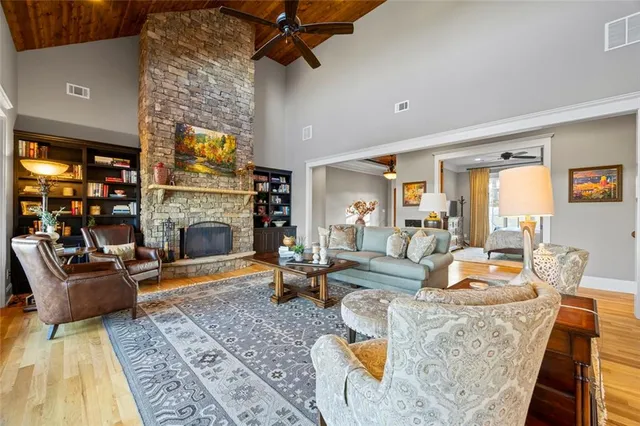 a kitchen with stainless steel appliances granite countertop a stove and a refrigerator