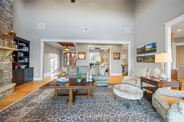 a kitchen with stainless steel appliances granite countertop a sink and a stove