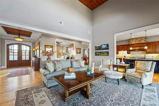 a bed room with a bed and a chair