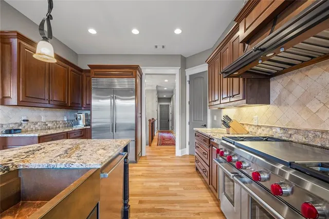 a view of a balcony with a yard