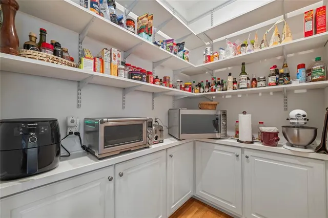 a bedroom with a bed and a tv