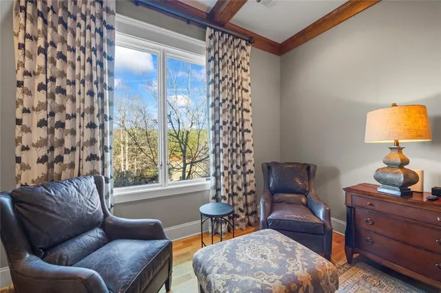 a en suite bathroom with a double vanity sink and a mirror