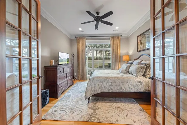 a front view of a house with yard and parking