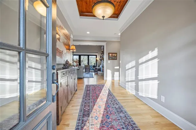 a living room with furniture and a rug