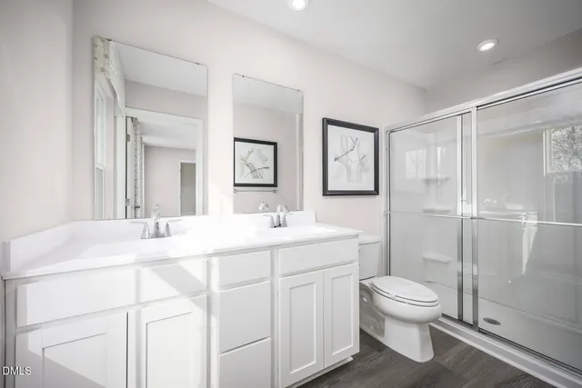 a bedroom with a bed and lamp