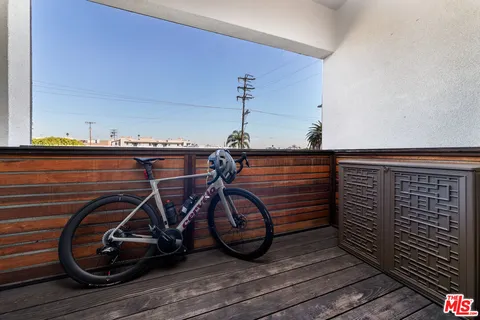 a view of a gym with wooden floor
