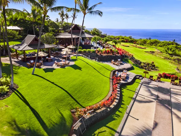 an aerial view of a pool patio swimming pool and outdoor seating