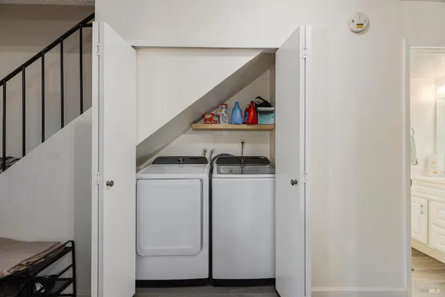 a utility room with dryer and washer